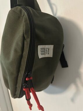 Topo Designs Olive Sling Bag with Red Zipper Pulls